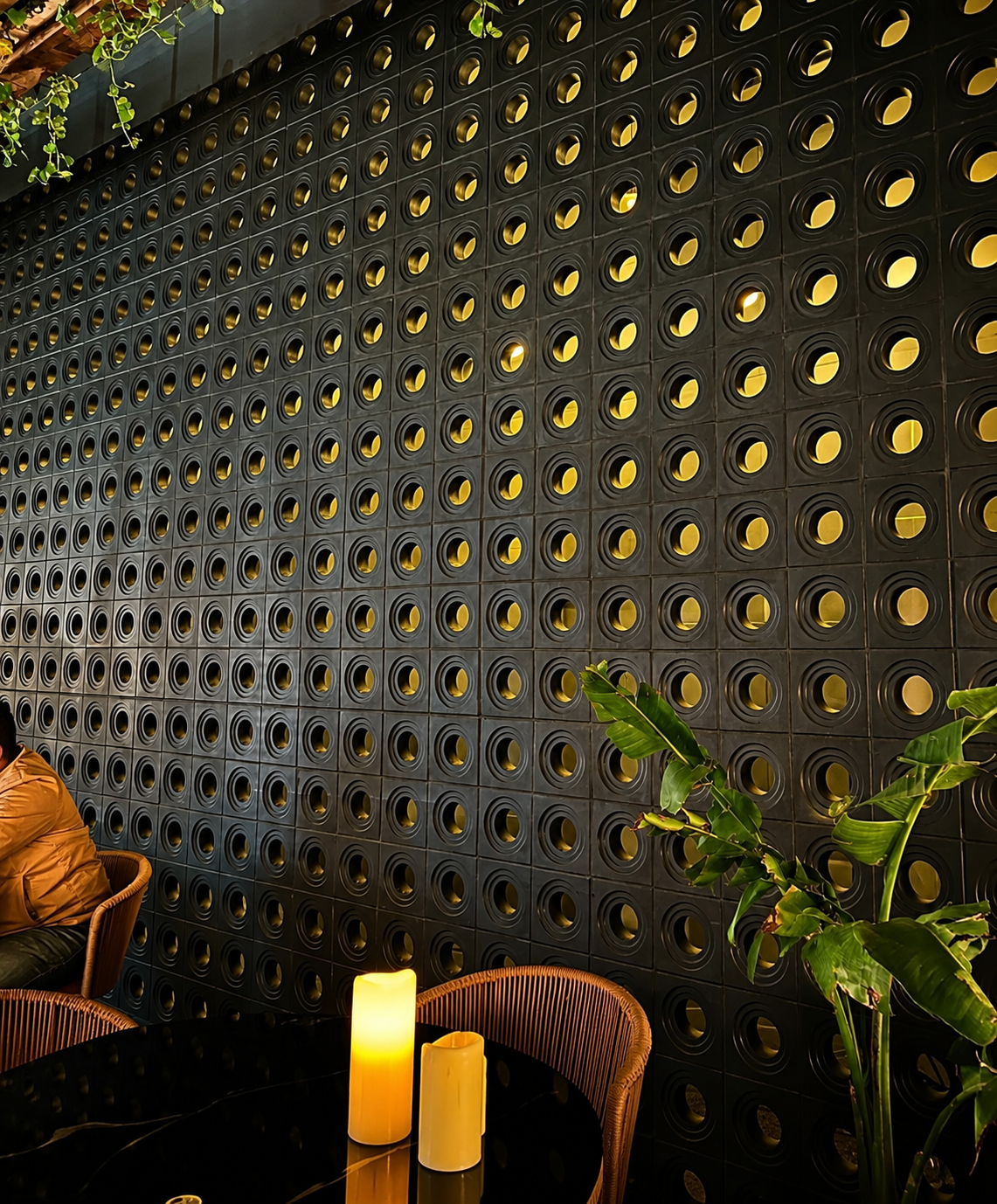 Black circular feature tile installation